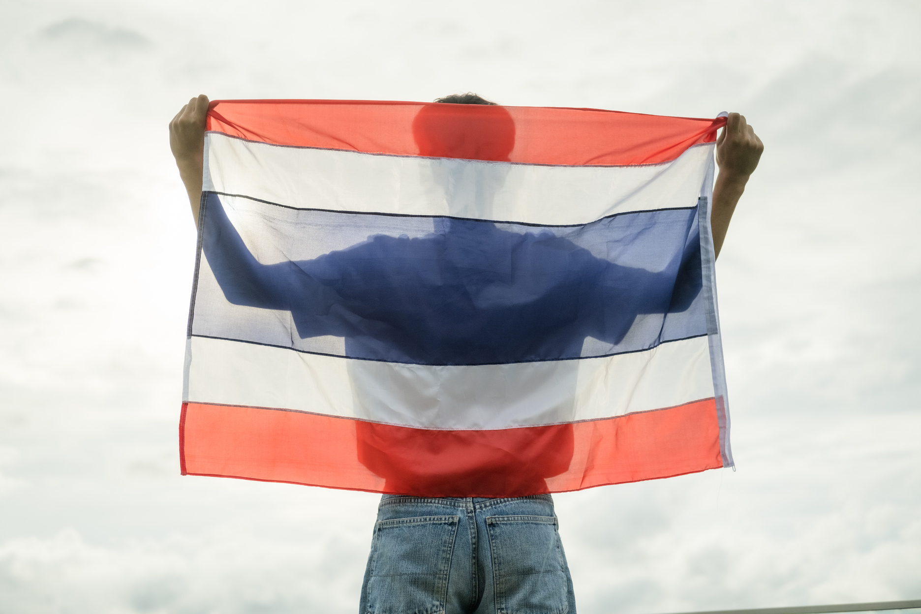 Young Man Holding Thai Flag